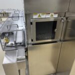 Outfeed door and mesh belt of the OPTIMA SHT 13 depyrogenation tunnel