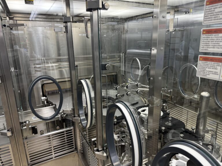 OPTIMA VFVM 18000 aseptic vial filling and stoppering machine under active open-RABS with glove ports