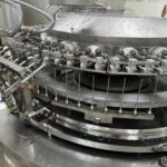 Capping heads and vial transfer of the OPTIMA VVM 2428 capping machine