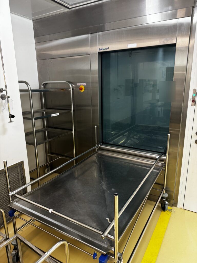 Belimed PH 860.2 pass-through washer-disinfector in cleanroom wall