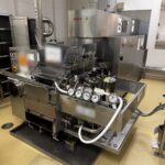 Bosch RUR E16 rotary ampoule washer in front of the Bosch TSQ U03 sterilising tunnel
