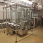 Groninger DFVK 6001 vial filling and stoppering machine with glass enclosure