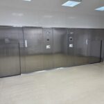 Telstar double-door pass-through autoclaves installed in a sterile production corridor
