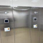 Loading side of a Telstar autoclave with chamber and jacket pressure gauges, operator panel and emergency stop
