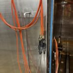 Door frame and validation port of the Telstar autoclave with thermocouple cables