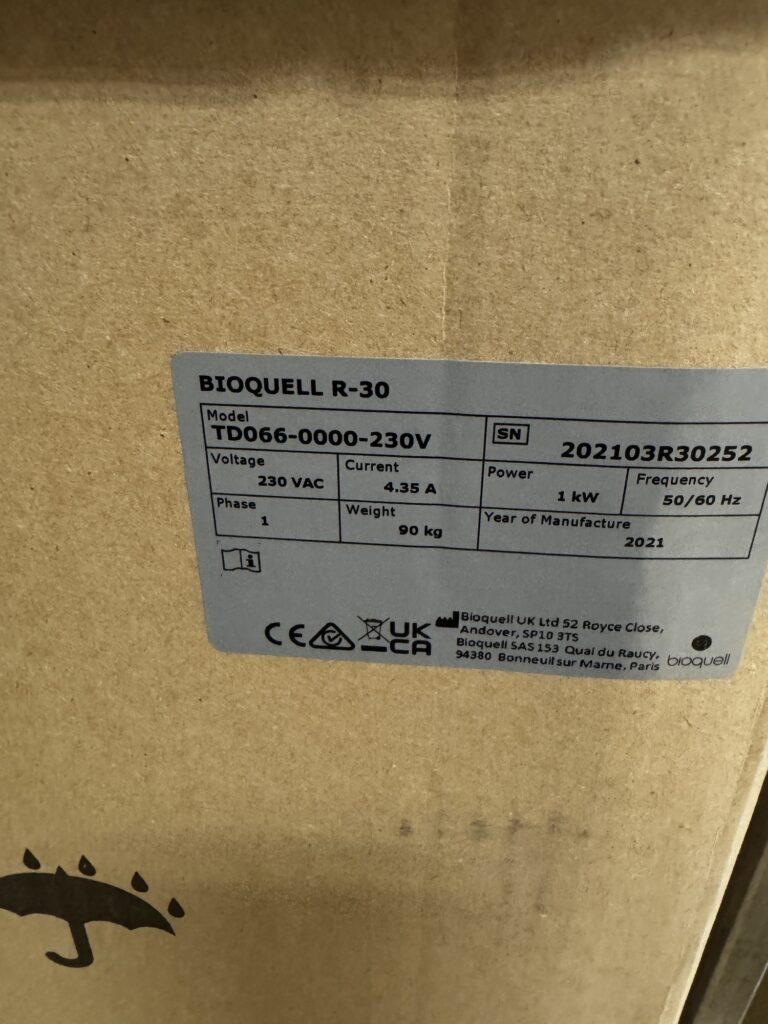 Bioquell R-30 catalytic aeration unit, unopened original packaging with the nameplate showing model TD066-0000-230V and year of manufacture 2021
