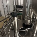 Filling station of the BOC Edwards line with stainless dosing pumps and product pipework