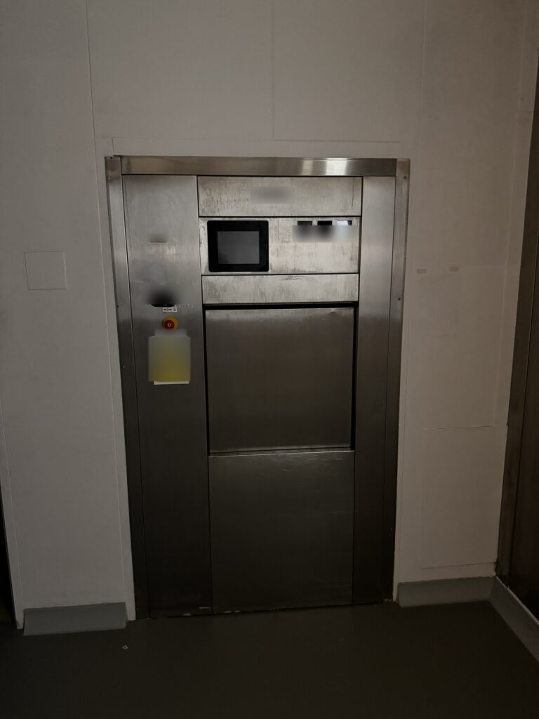 Getinge GE 2612 ARB-2 steam sterilizer, loading side with touch panel and chamber pressure gauge